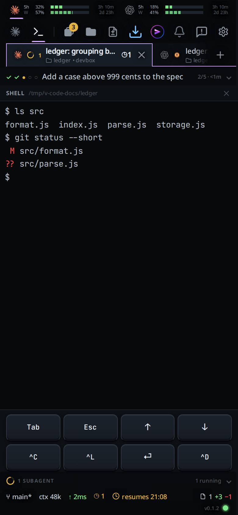 The terminal filling the screen with ls, git status and a $ prompt, and the keypad under it.